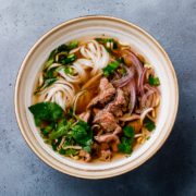 Pho Bo vietnamese Soup with beef in bowl on concrete background on our daily blog Southeast Asian Food Vietnamese Pantry Staples our blog stories