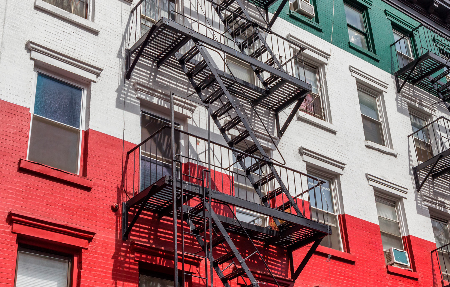 Building in the colors of the Italian flag in Little Italy, New York, USA