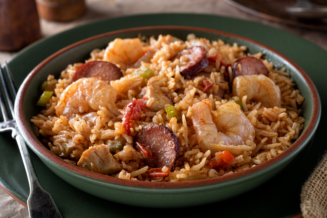 A bowl of delicious cajun style jambalaya with shrimp, chicken and sausage.